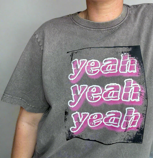acid wash Grey t-shirt with pink and white 'yeah yeah yeah' text design this is mabel