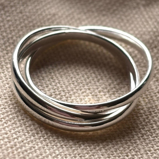 Silver triple lock fidget ring.