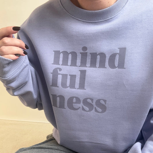 this is mabel oversized violet sweatshirt with 'mindful fitness' text on a neutral background