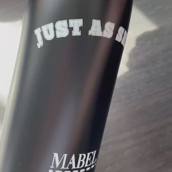 this is mabel black water bottle with just as she is statement 
