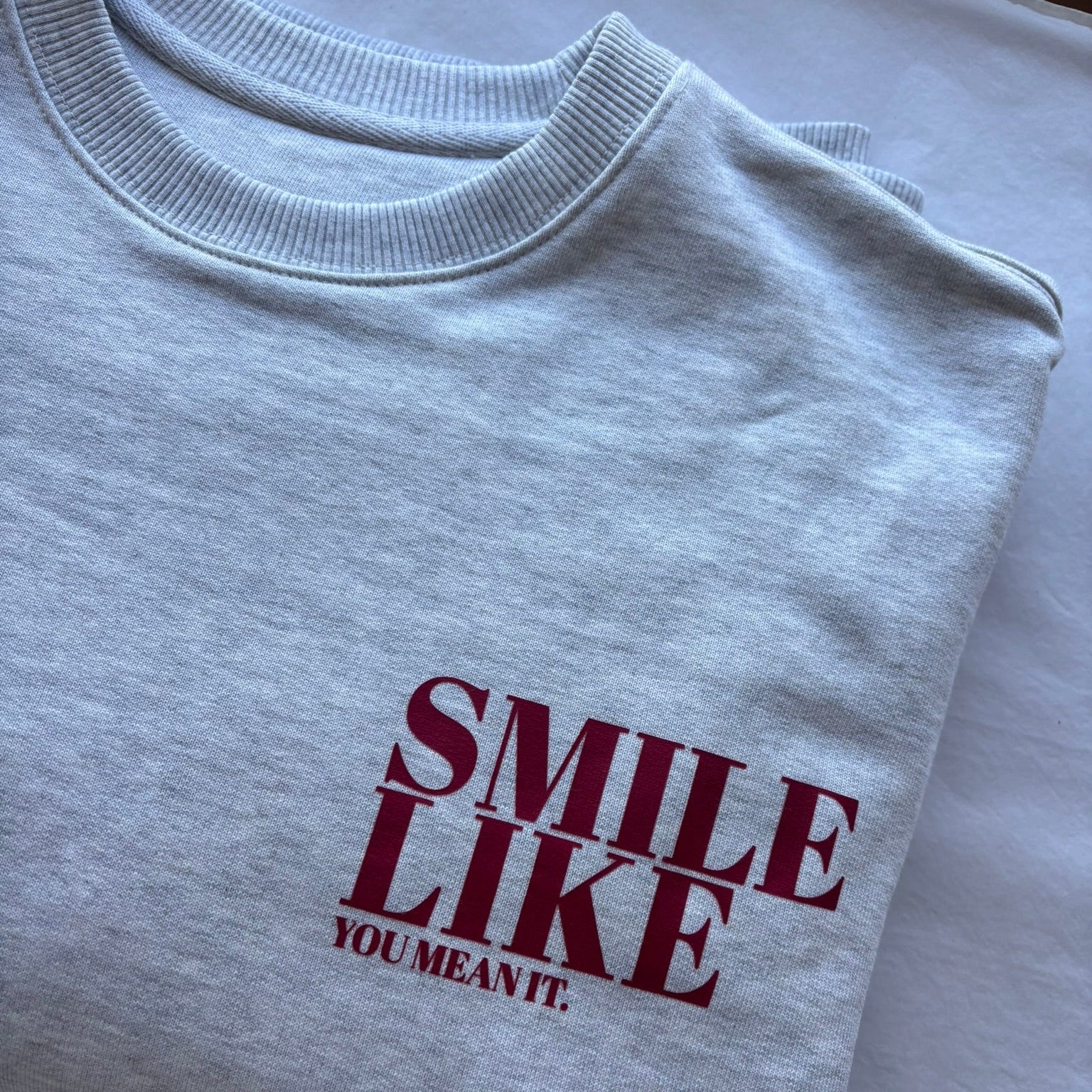 Smile Like You Mean It Unisex Sweater - This is Mabel