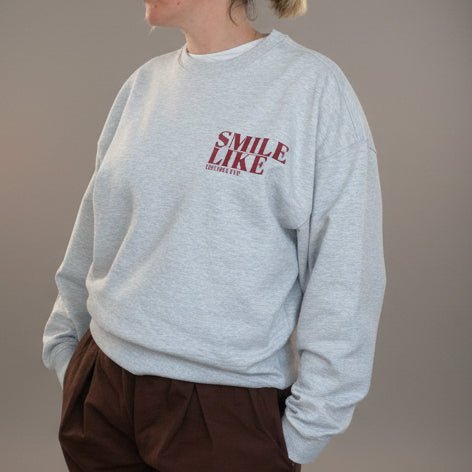 Smile Like You Mean It Unisex Sweater - This is Mabel